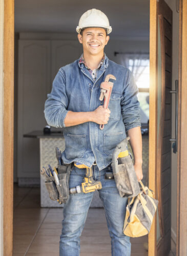 Handyman in portrait, maintenance job and tools with construction and home renovation, builder with.